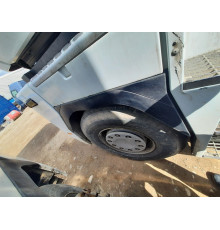 Б/у Накладка на крило кабіни (півмісяць, арка) ліва сторона Renault Magnum Euro 5 (Рено Магнум Евро 5) 5010574800