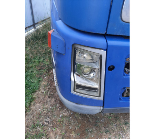 Б/у облицовка (окуляр) фары правой (R) Volvo FH12 Euro 3 (Вольво ФШ 12 Евро 3) 20452889
