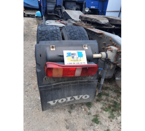 Б/у крило заднє, ліве (L), з фонарем (ліхтарем) та кронштейном Volvo FH12 Euro 3 (Вольво ФШ 12 Євро 3) 20392599, 20392544