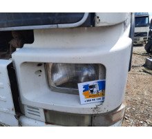 Б/у облицювання (окуляр) фари лівої (L) Volvo FH12 Euro 2 (Вольво ФШ 12 Євро 2) 20398385