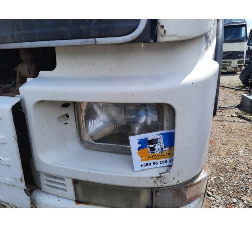 Б/у облицовка (окуляр) фары левой (L) Volvo FH12 Euro 2 (Вольво ФШ 12 Евро 2) 20398385
